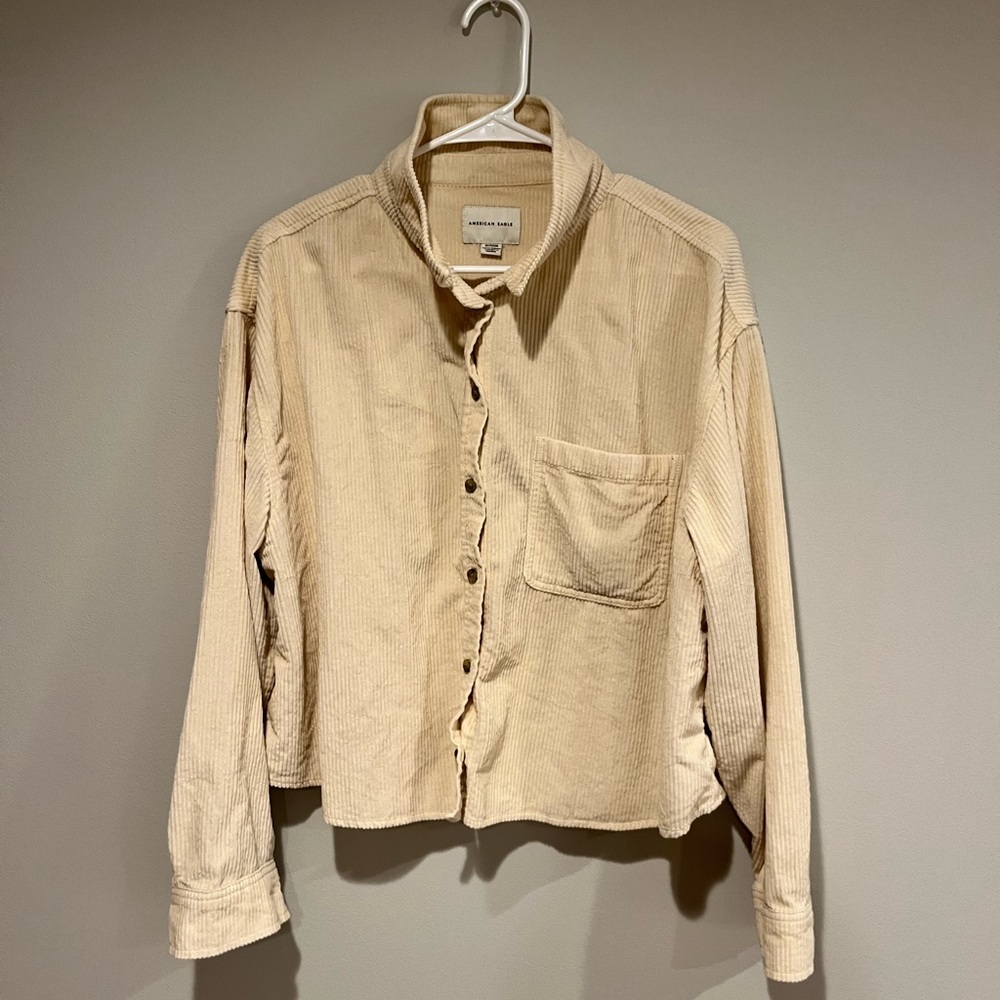 Textured button up top